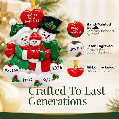 Hand-painted details and laser engraved personalization on the new parents snowman christmas ornament, ribbon included