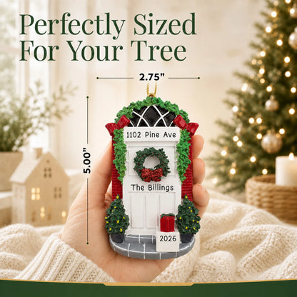 Size guide: the personalized Holiday White Door christmas ornament is 2.75 in wide by 5.00 in tall, shown in hand