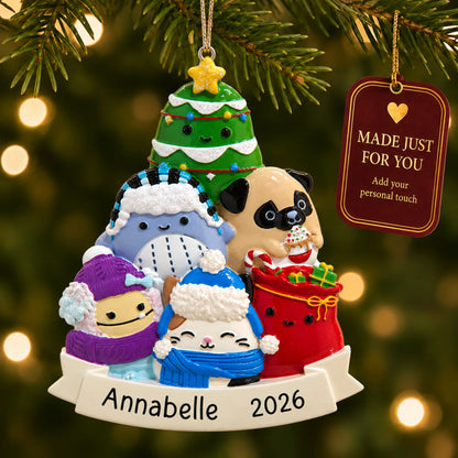 Squishmallows christmas ornament hanging on a lit Christmas tree with a Made Just For You gift tag
