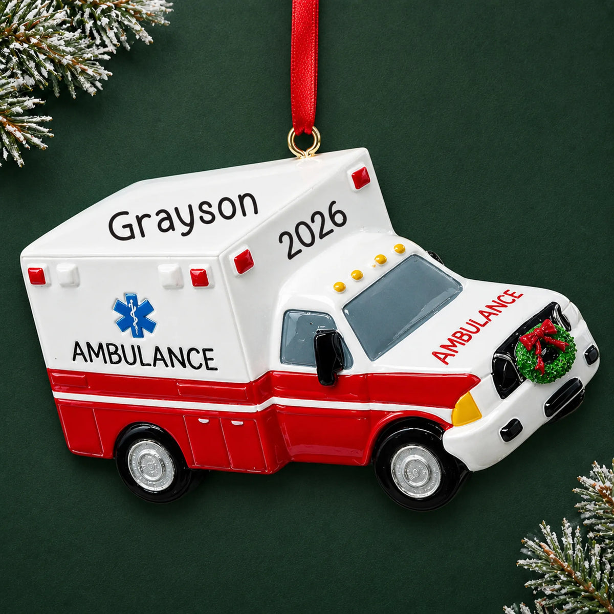 Personalized paramedic ambulance christmas ornament on a dark green pine background