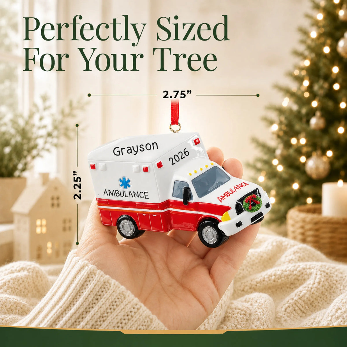 Size guide: the personalized paramedic ambulance christmas ornament is 2.75 in wide by 2.25 in tall, shown in hand