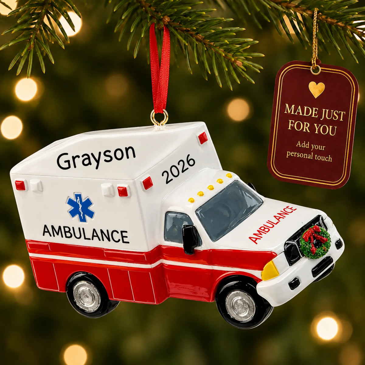 Paramedic ambulance christmas ornament hanging on a lit Christmas tree with a Made Just For You gift tag