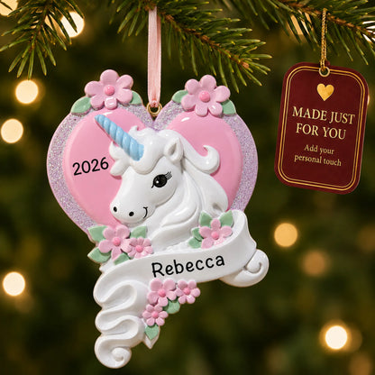 Unicorn heart christmas ornament hanging on a lit Christmas tree with a Made Just For You gift tag