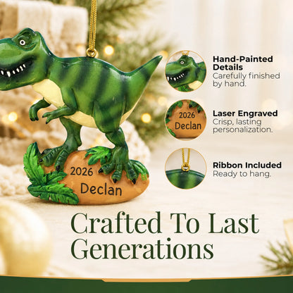 Hand-painted details and laser engraved personalization on the t-rex dinosaur christmas ornament, ribbon included