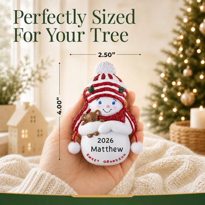 Size guide: the personalized sweet grandson christmas ornament is 2.50 in wide by 4.00 in tall, shown in hand