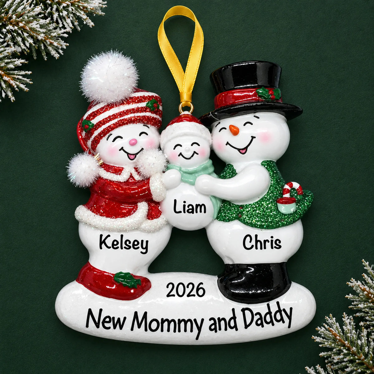 Personalized new parents 1st christmas ornament on a dark green pine background