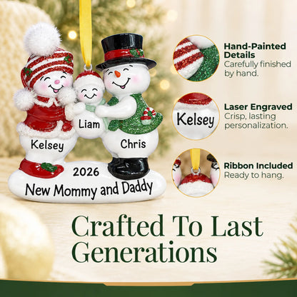 Hand-painted details and laser engraved personalization on the new parents 1st christmas ornament, ribbon included