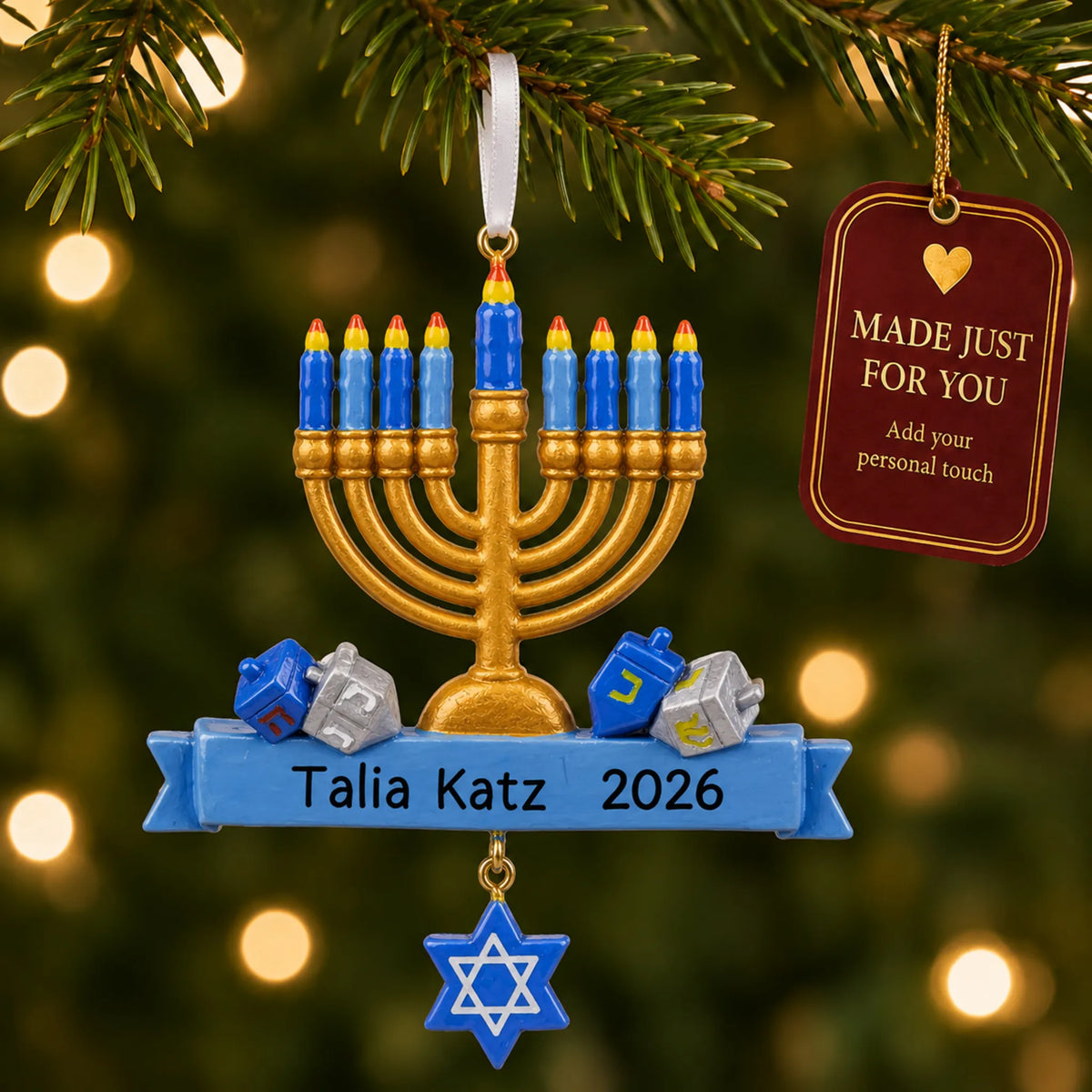 Hanukkah Menorah christmas ornament hanging on a lit Christmas tree with a Made Just For You gift tag