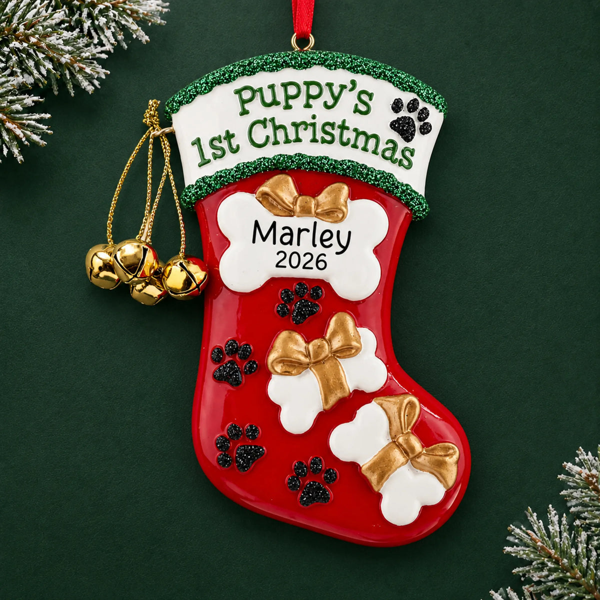 Personalized Puppy's First Christmas Stocking ornament on a dark green pine background