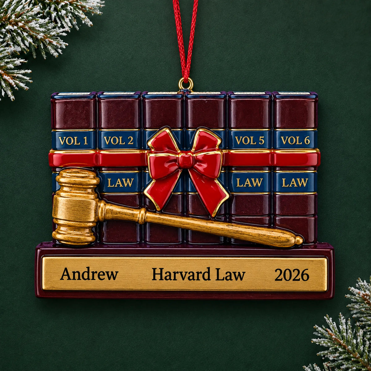 Personalized attorney law and gavel christmas ornament on a dark green pine background